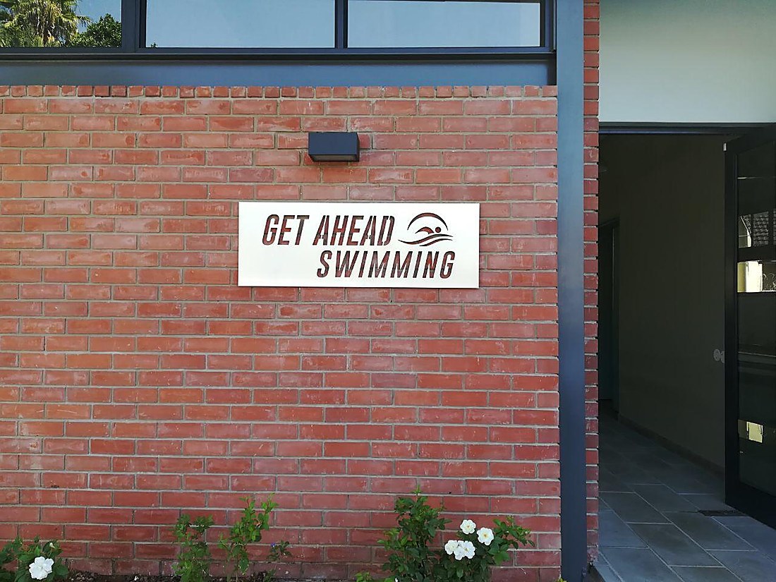 Get Ahead Swimming sign at the facility entrance in Fairvale